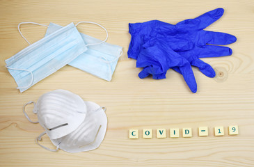 Coronavirus / COVID-19 banner / flatlay showing, mask, thermometer and pills.