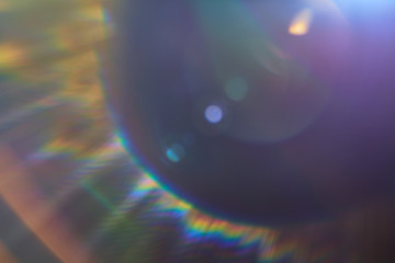 Abstract lens flare on a black background. - 334703245