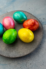 selective focus, colored chicken eggs with food dye