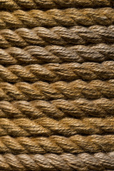 Background of interlacing ropes of white color shot closeup.