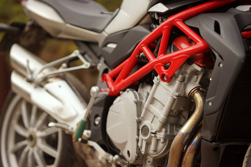 Obraz premium Technician hands repairing motobike, doing repair service, maintenance worker repairing vehicle with wrench, service and maintenance motocycle check 