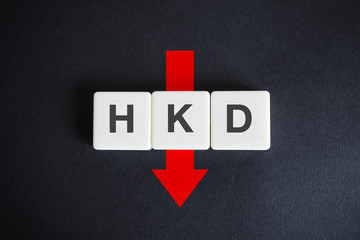 Hong Kong Dollar—alphabetic currency ISO code (HKD) and down red arrow on black background.