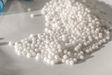 Homeopathy granules medicine isolated on a White Background