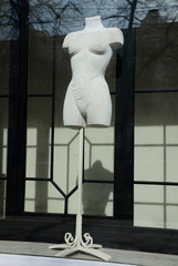 Mannequins in shop windows of a closed shop during the coronavirus epidemic.