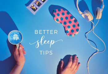 Text "Better sleep tips". Healthy night sleep creative concept. Sleep mask in pastel colors, earphones, calming pills to help insomnia, sleep log notebook. Blue mint background, long shadow design.