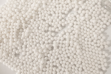 Homeopathy granules medicine isolated on a White Background