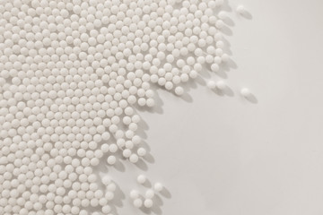 Homeopathy granules medicine isolated on a White Background