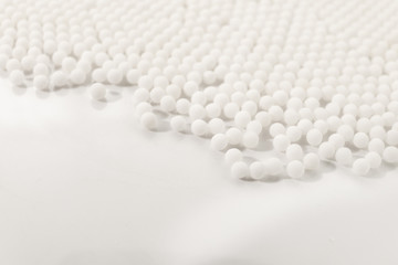 Homeopathy granules medicine isolated on a White Background