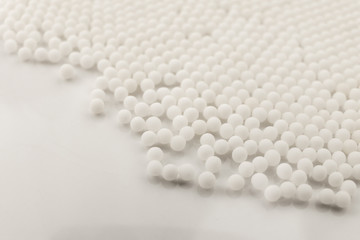 Homeopathy granules medicine isolated on a White Background