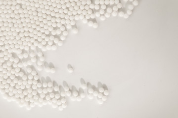 Homeopathy granules medicine isolated on a White Background