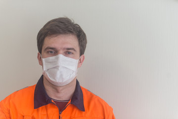 Man in orange uniform weared medical mask