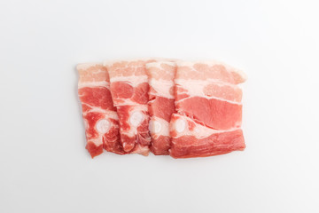 Sliced ​​pork belly on white background