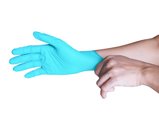 Use hand to wearing rubber gloves to clean and protect against germs isolated on white background with clipping path.
