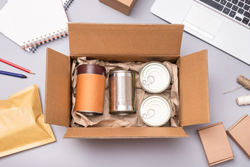 Food delivery service, canned food in cardboard box