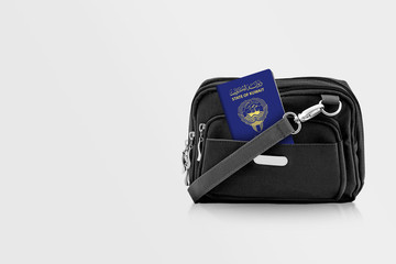 Kuwait Passport in Black Travel Bag Pocket with Copy Space on Isolated Background