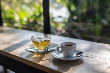 cup of coffee on wooden table