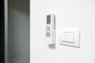 Naklejka premium Electronic light swiths and remote control of air conditioner