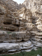 Wadi Shab, beautiful scenery, high rocks, stream with clear water. Oman