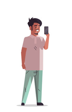 indian man taking selfie photo on smartphone camera smiling male cartoon character standing pose full length isolated vertical vector illustration