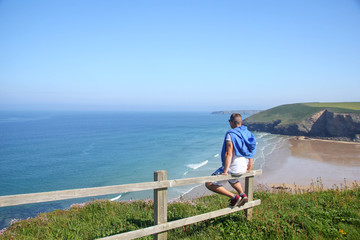 man walking on a beach