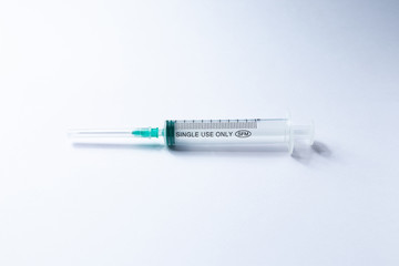 10 ml medical syringe for injection on a white background