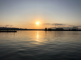 Fototapeta na wymiar Pink Sunset from the port.