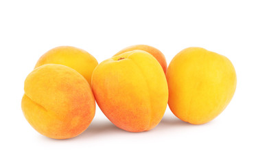 Fresh ripe whole, half and sliced apricot isolated on white background