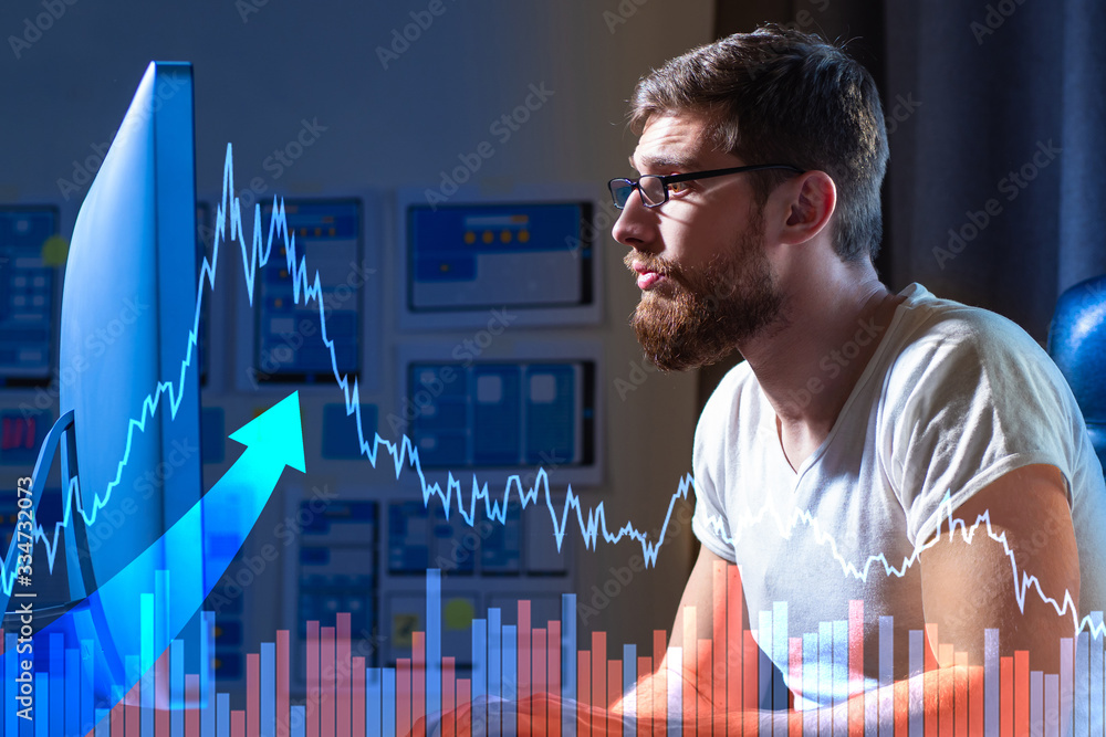 Poster graph of indicators on the background of man in the office. human works in an office. man in front o