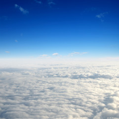 White clouds. View from the window of an airplane