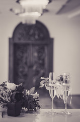 two glasses with champagne at the wedding ceremony