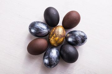 Holidays, design and modern easter concept - Black and brown easter eggs style minimalism