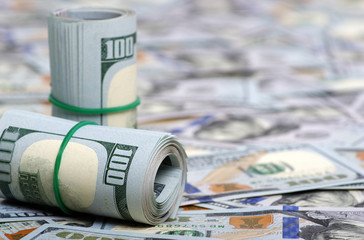  dollars in roll on money background