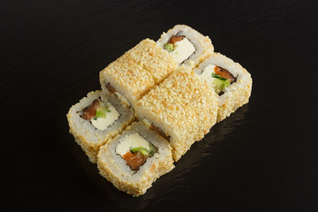 Japanese food: Set of salmon sushi and rolls with salmon and eel