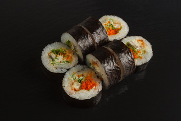 Japanese food: Set of salmon sushi and rolls with salmon and eel