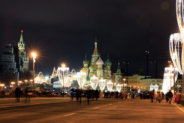 Night view of Intercession Cathedral St. Basil's on Red square and Moscow Kremlin wall Towers, Moscow, Russia