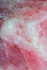 Fototapeta premium Close Up of a Healing Crystal Shiny Gemstone in Pink