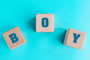 lettering The boy on the turquoise background, the concept of the birth of a baby boy