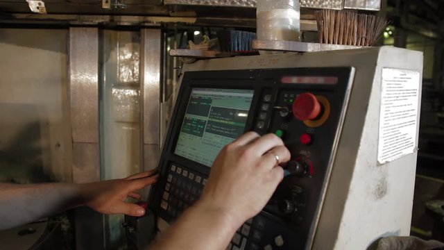 Cnc machine management screen. Metalworking milling machine. Produces metal detail in a factory. Machine tools for metal working. Steel industry