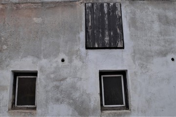 Windows on an old wall