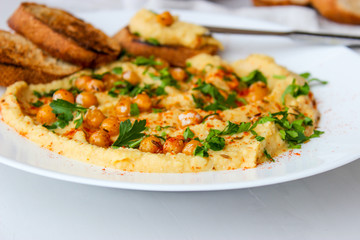 Fototapeta na wymiar Chickpea hummus, made with croutons