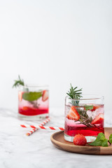 Summer strawberry drink on marble white background.