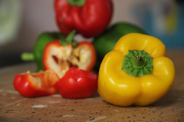 red peppers on wooden board