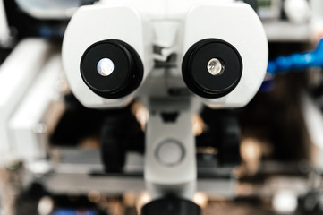 Fototapeta na wymiar close-up of microscope eyepieces