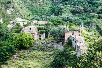 Fototapeta na wymiar A walk trekking an abandoned village in a small town