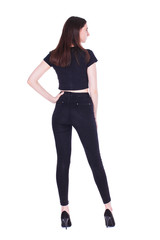 Fototapeta premium Back view portrait young beautiful brunette woman in black jeans