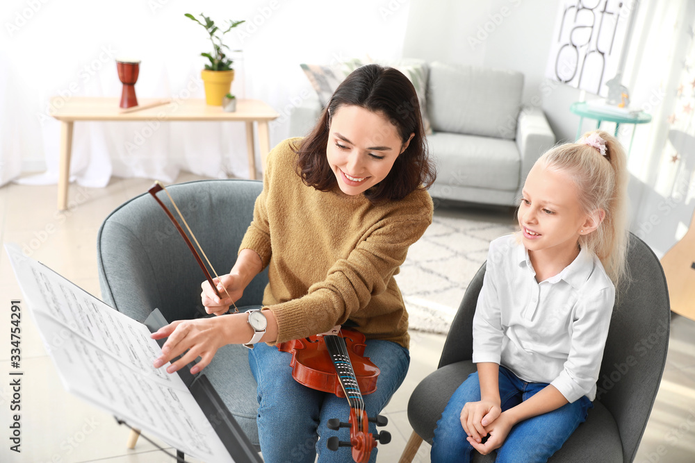 Poster private music teacher giving violin lessons to little girl at home