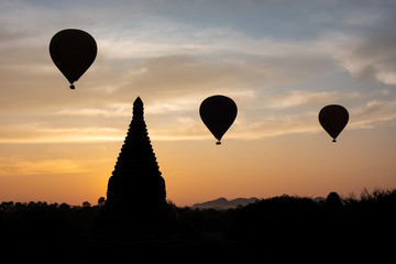 Scenic sunrise with hot air balloons over Bagan in Myanmar.