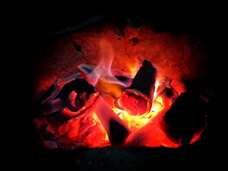Abstract., Fire in the fireplace have the dark background.