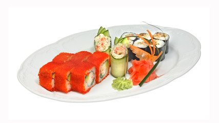 Sushi with crab and rolls with tobiko, crab, avocado, cucumber eel and nori. Ginger and wasabi on white oval plate