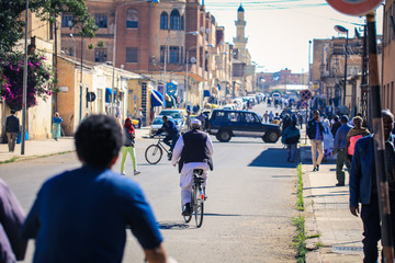 Asmara, Eritrea - November 02, 2019:  Yellow Taxi and other Cars on the Central street